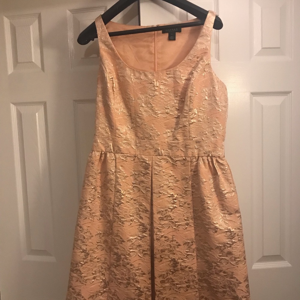 Rose gold cocktail dress. Worn once. Has pockets!